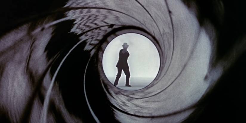 James Bond shoots his gun in an iris sH๏τ from Dr. No.