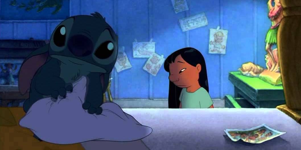 Stitch looking sad on the bed in Lilo and Stitch 2002