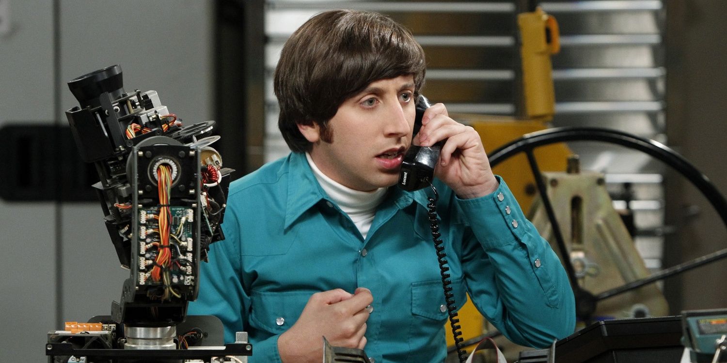 Howard talking on the phone at his office in Caltech
