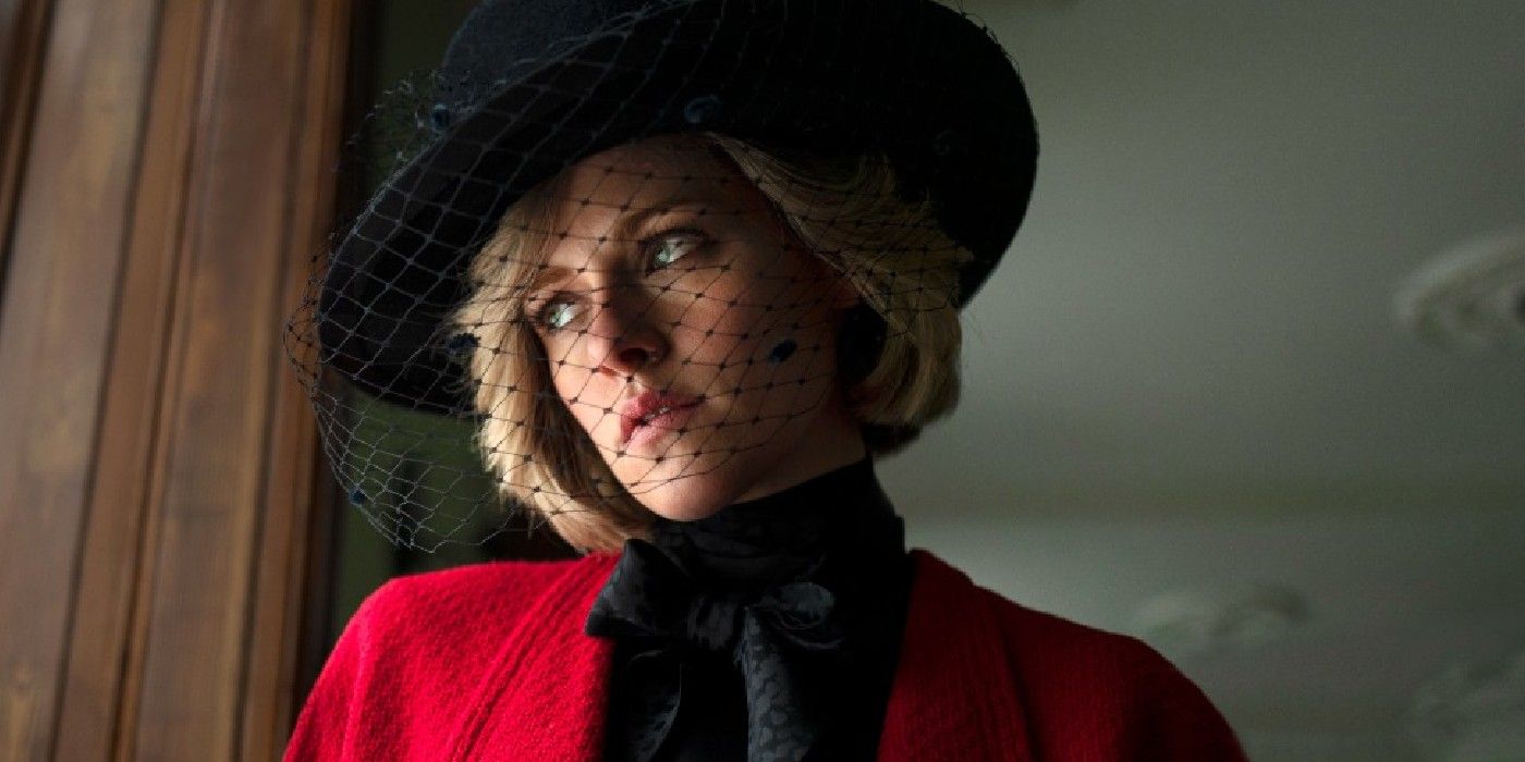 Kristen Stewart as Princess Diana wearing a hat with a net