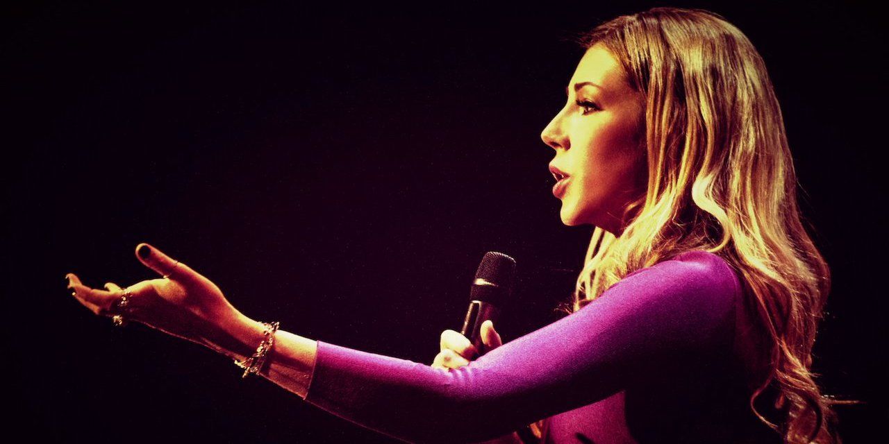 A promo shot of Katherine Ryan doing stand up for her Netflix special 22In Trouble22