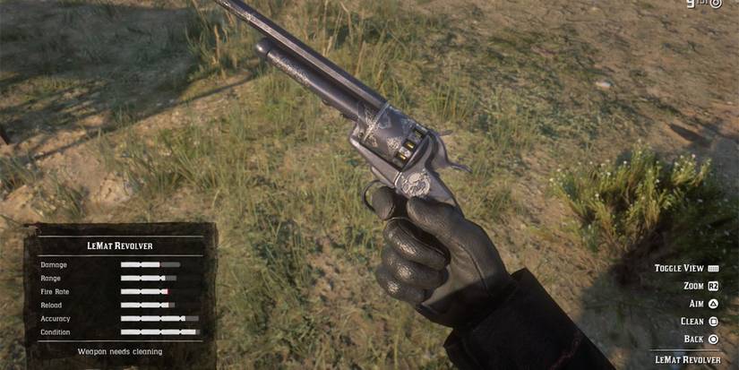 Arthur Morgan's hand holding a LeMat Revolver in RDR2.