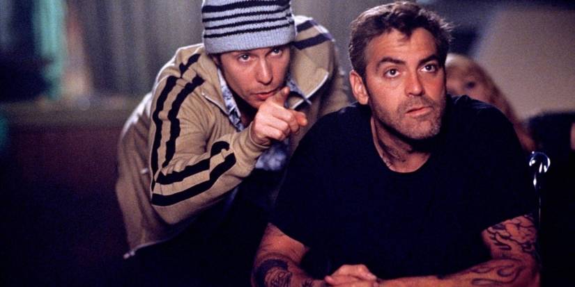 Jerzy (George Clooney) tries to get himself and Pepe (Sam Rockwell) out of prison in Welcome to Collinwood