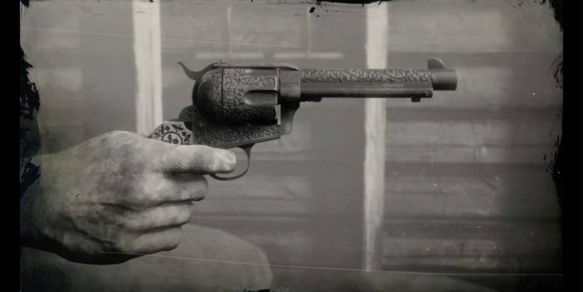 A black and white image of someone holding the Granger Revolver in Red Dead Redemption 2