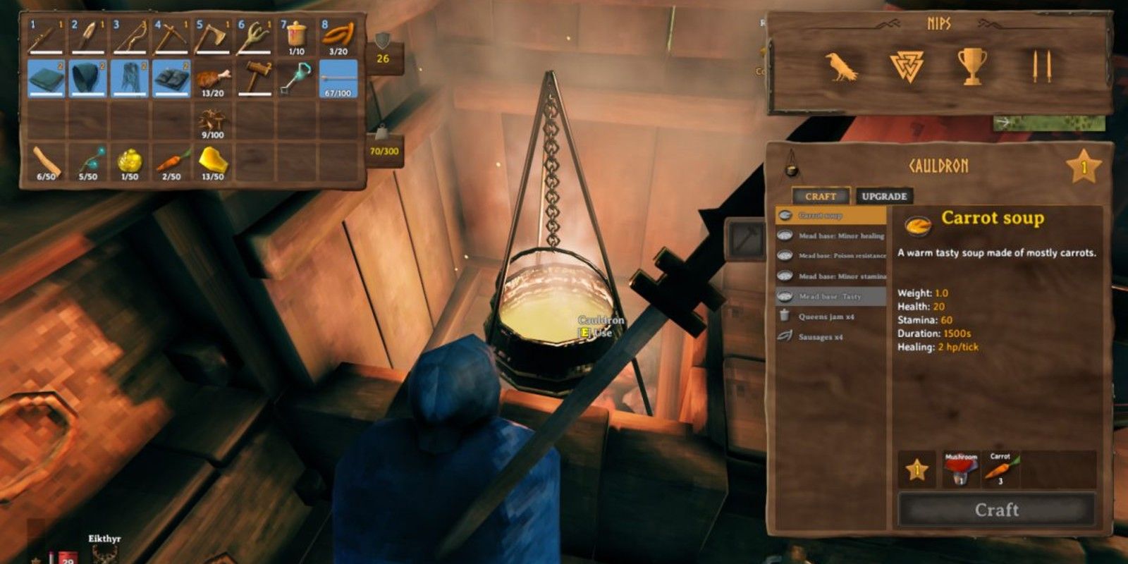 Un jugador cocina en el Caldero de Valheim.