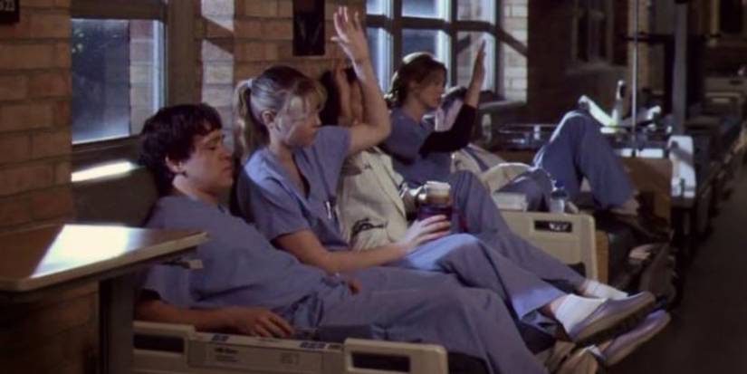 grey's anatomy the interns all putting their hands up