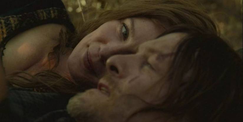 Daryl and Leah lay together