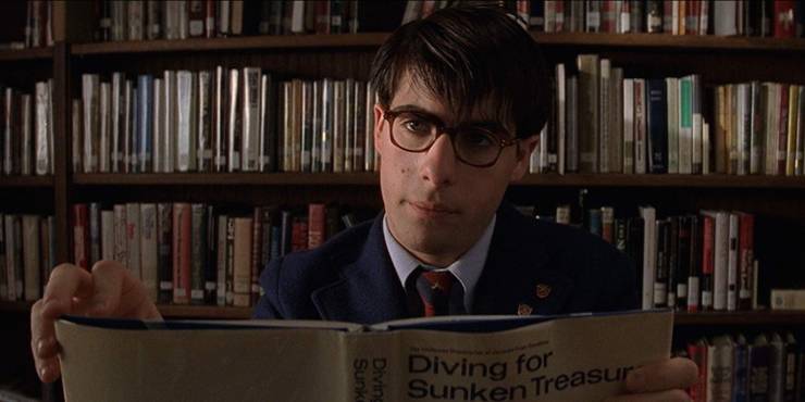 Underrated '90s Movies That Deserve More Love, Ranked 10 Jason Schwartzman as Max Fischer reading a book in Rushmore.jpg?q=50&fit=crop&w=740&h=370&dpr=1