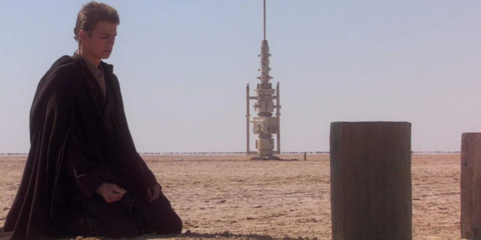 Anakin sitting in front of his mother's gravestone on Tatooine in Attack of the Clones