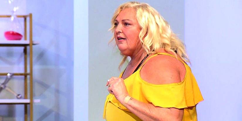Angela in 90 Day Fiance in yellow off shoulder top shouting at Tell All