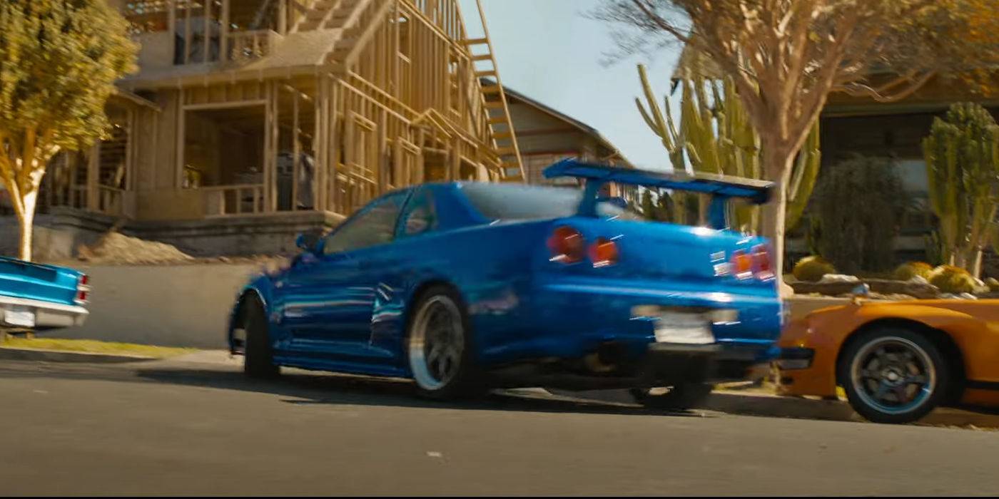 Brian's blue and silver Nissan Skyline driving in F9