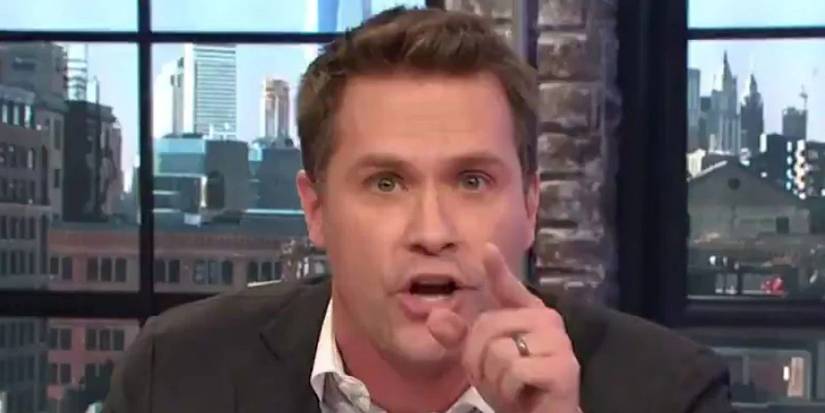 Kyle Brandt pointing finger aggressively and looking into camera.