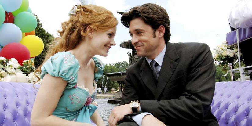 Giselle and Robert smiling at each other in Enchanted in a carriage