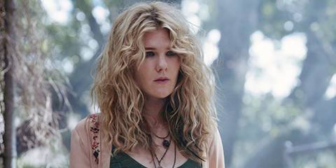 Misty Day standing outside in a scene from AHS Coven