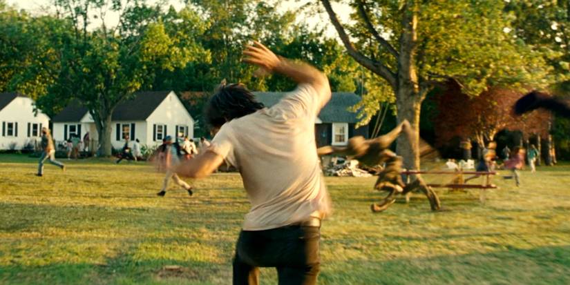 Cillian Murphy running as an alien attacks in A Quiet Place 2