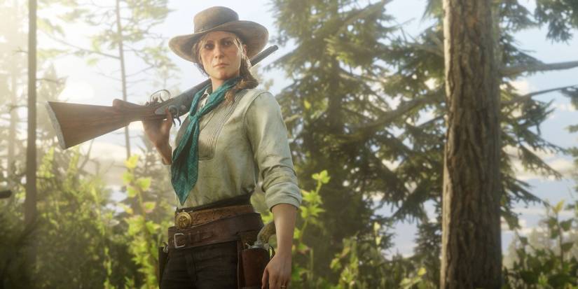 Sadie Adler in Red Dead Redemption 2 holding a long gun. 