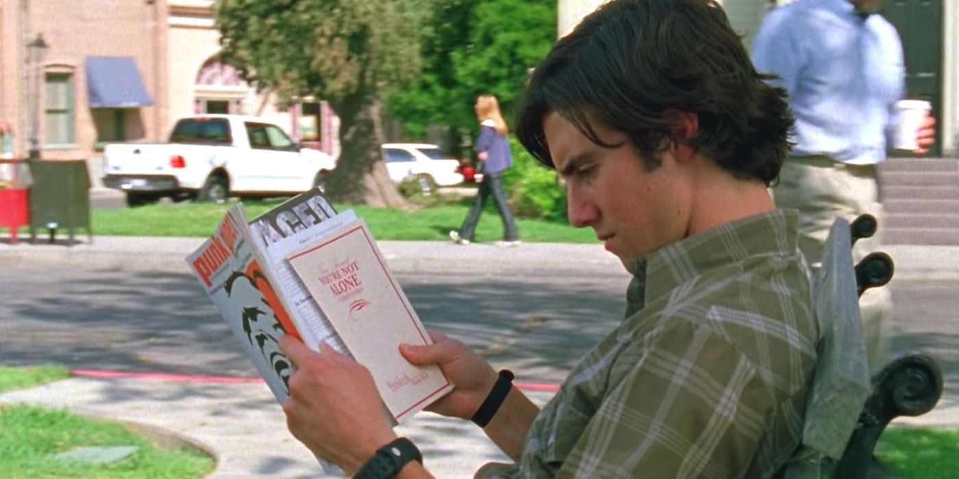 Jess reading a book outside of Stars Hollow on Gilmore Girls