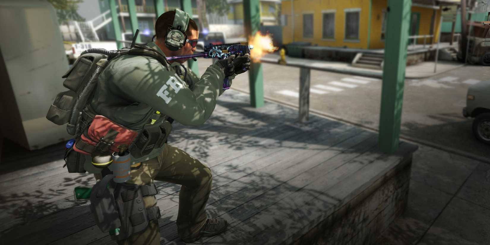 A player fires a machine gun in Counter Strike Global Offensive