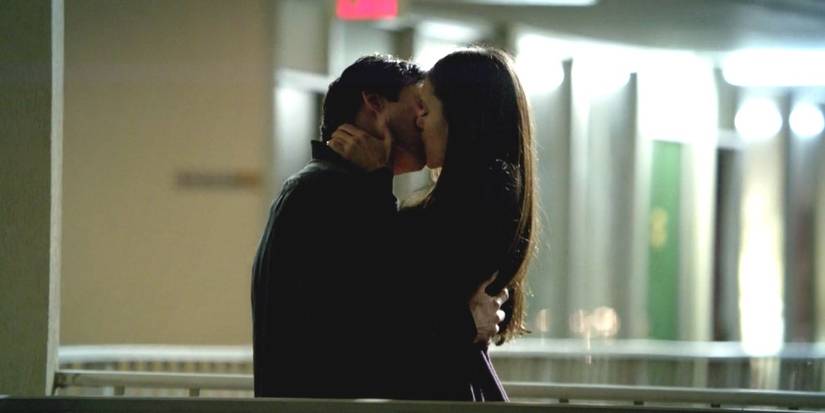 Damon and Elena kiss on a motel balcoy in The Vampire Diaries