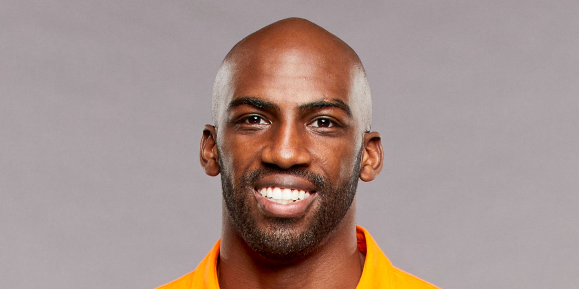 Xavier Prather smiling for a promo photo for Big Brother.