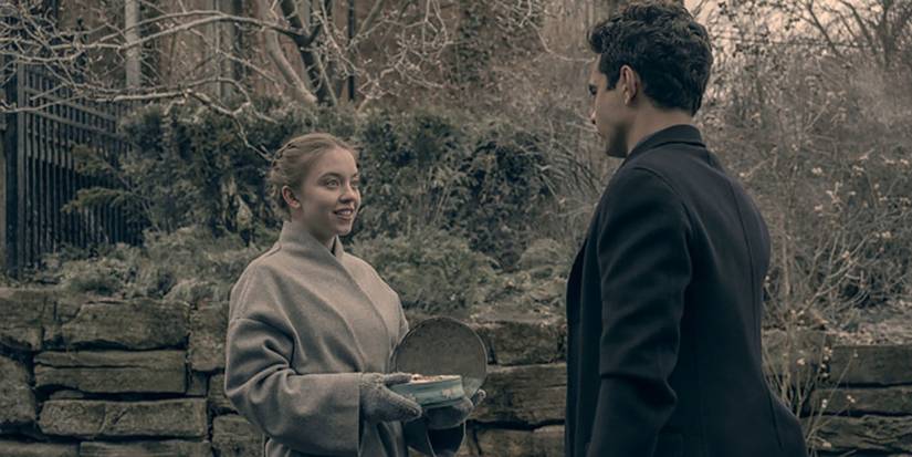 Eden talking outside to Nick on The Handmaid's Tale