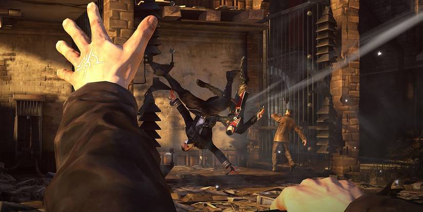 Corvo uses magic power to hurl an enemy away in Dishonored 2