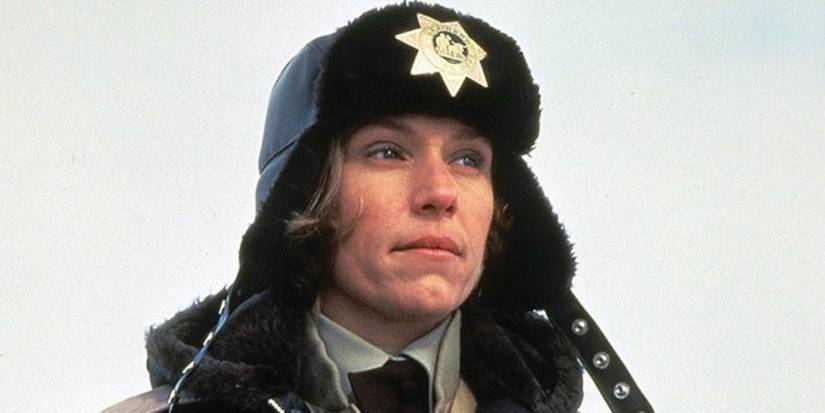 Marge Gunderson outside looking out at the distance in Fargo