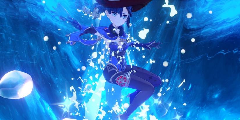 Mona is submerged in blue water in Genshin Impact.