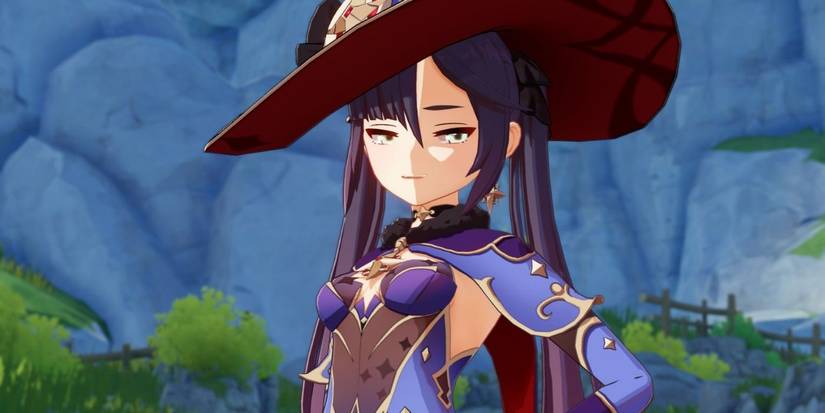 Mona with one hand on her waist looking haughty in Genshin Impact