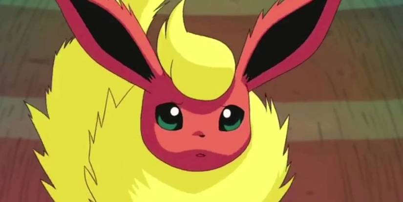 A Flareon looks up with wide eyes in the Pokémon anime.