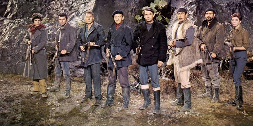 The squad posing for a picture in The Guns of Navarone.