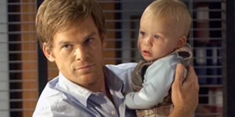 Dexter Morgan holding his son Harrison in Dexter