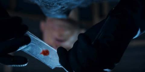 Dexter looking at a splatter of blood in Dexter season 9.