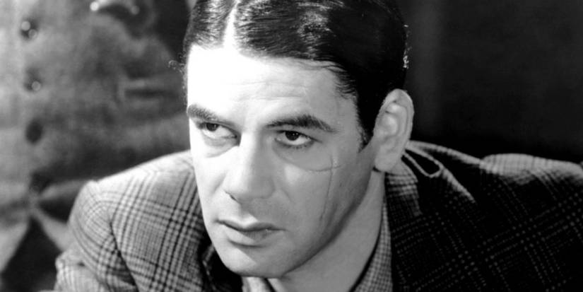 Paul Muni como Tony Camonte no filme Scarface original de 1932.
