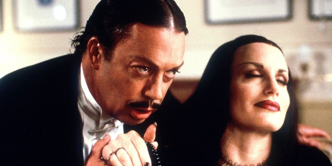 Gomez and Morticia hold hands in Addams Family Reunion