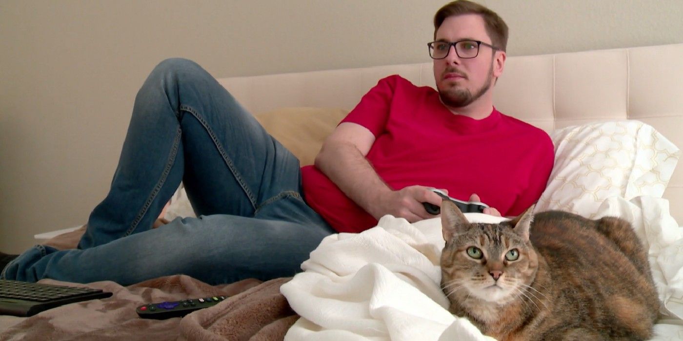 Colt Johnson with cat in 90 Day Fiance