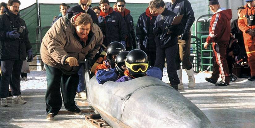 10 Greatest '90s Kids Movies Ever Made 2 John Candy helps push the bobsled down the ice in the 1993 film, Cool Runnings.
