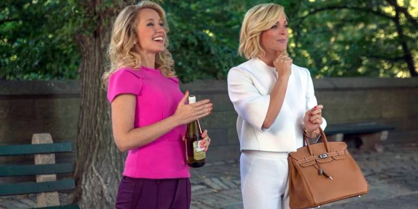 Deirdre Robespierre and Jacqueline White watch their children in the park in Unbreakable Kimmy Schmidt