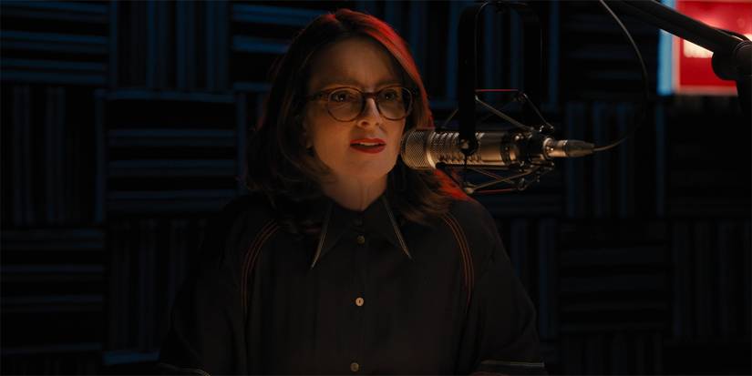 Tina Fey as Cinda Canning talking to a microphone in Only Murders in the Building
