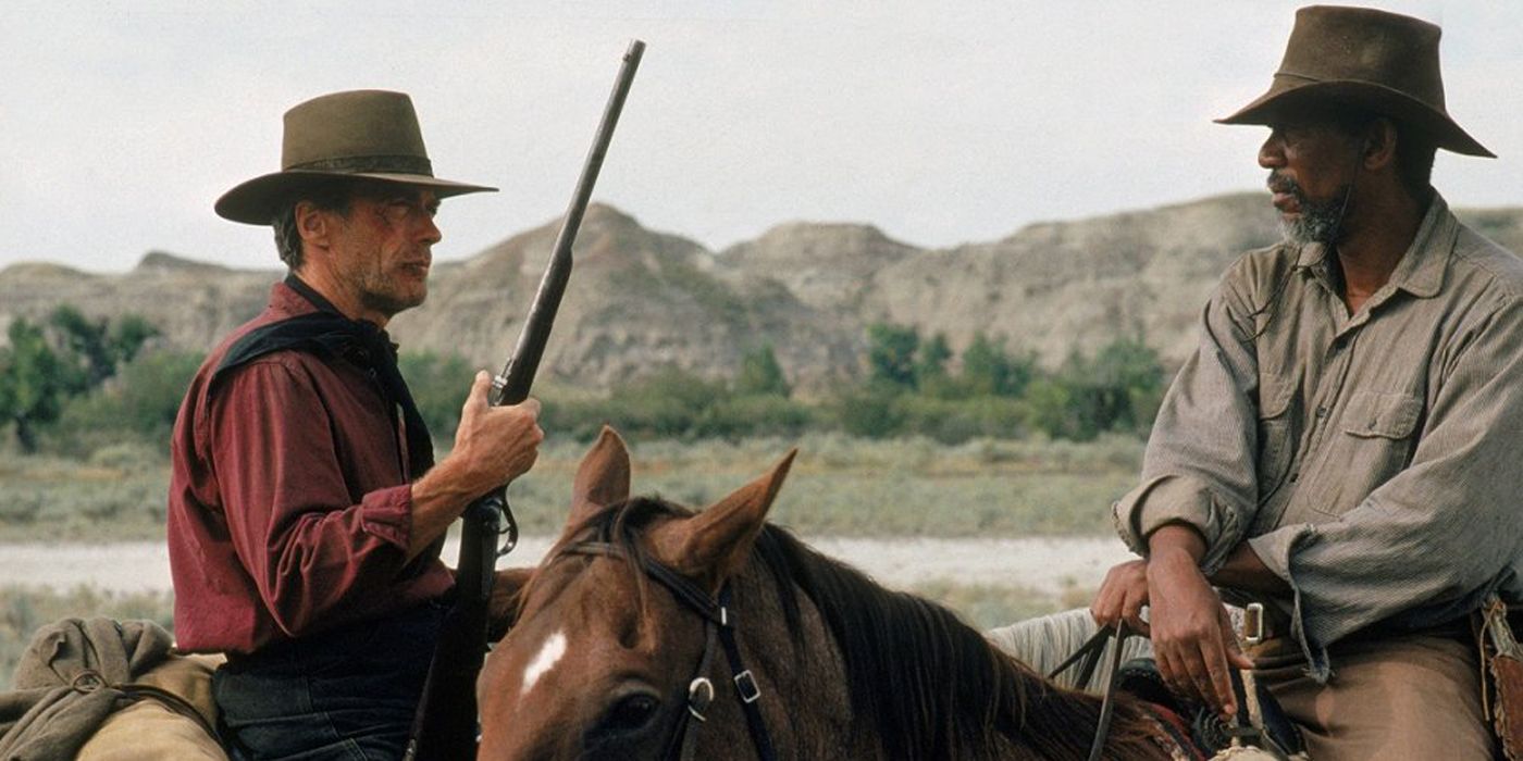 Clint Eastwood and Morgan Freeman talking on horses in Unforgiven
