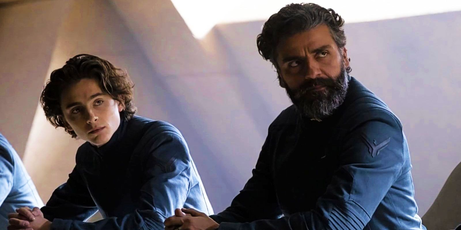 Paul Atreides (Timothee Chalamet) and the Duke (Oscar Isaac) sharing a moment in Dune (2021)
