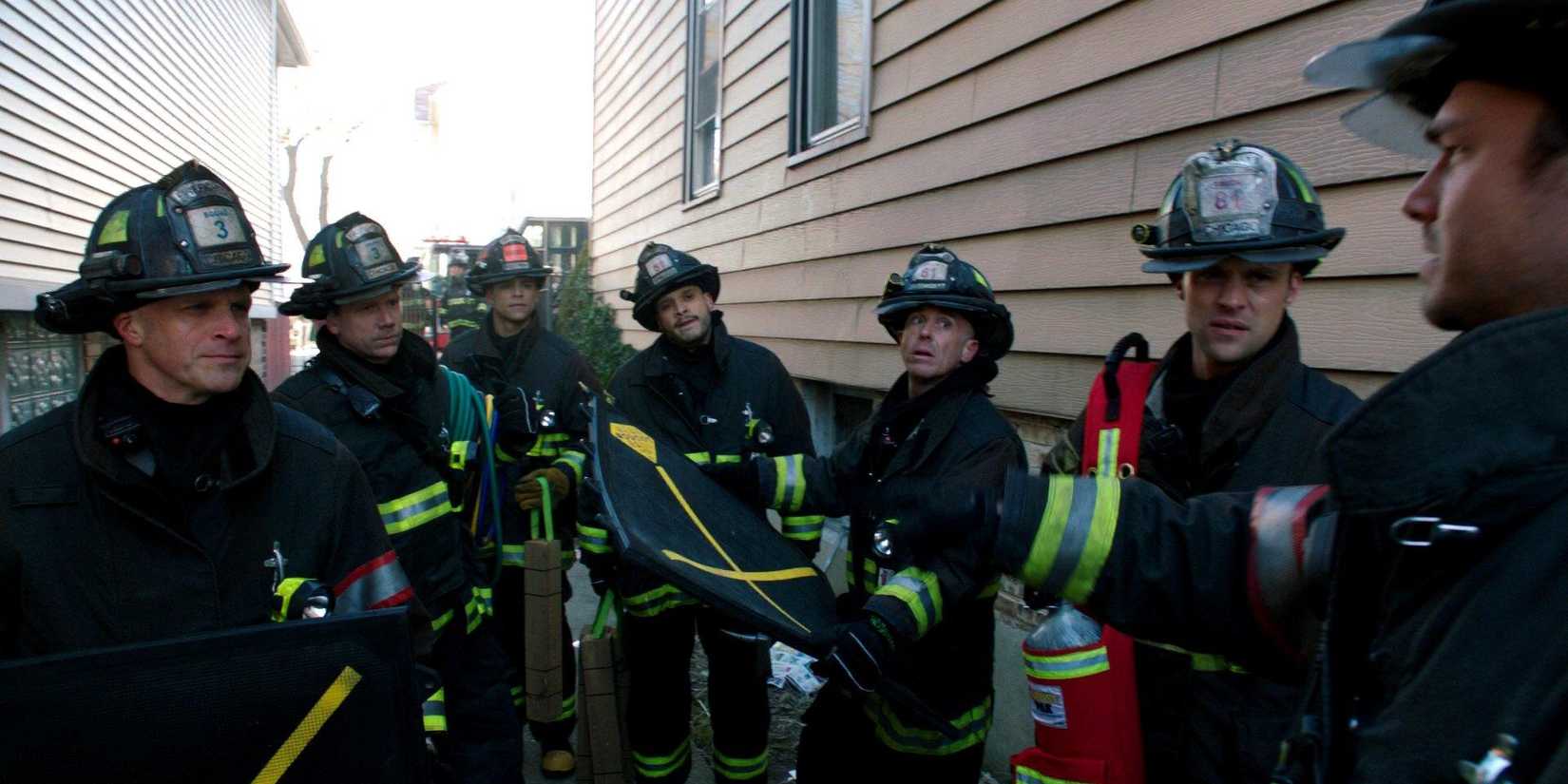 Firehouse 51 members try rescuing a child trapped in a laundry chute in Chicago Fire