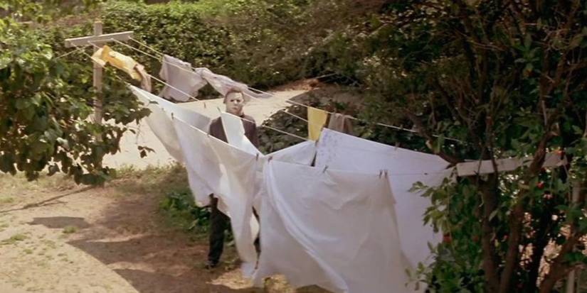 Michael spies on Laurie outside her house in Halloween.