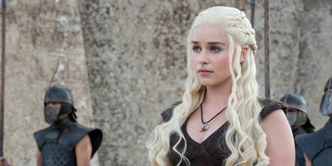 Daenerys Targaryen standing alongside her Unsullied army in Game of Thrones.