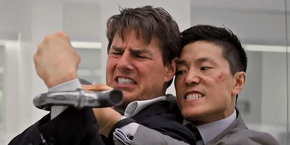 Fake John Lark holds a pipe to Ethans throat in Mission Impossible Fallout Cropped 1