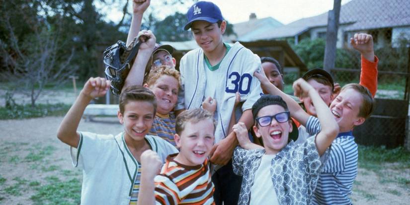 10 Greatest '90s Kids Movies Ever Made 3 Smalls and the rest of the team celebrate in The Sandlot, 1993