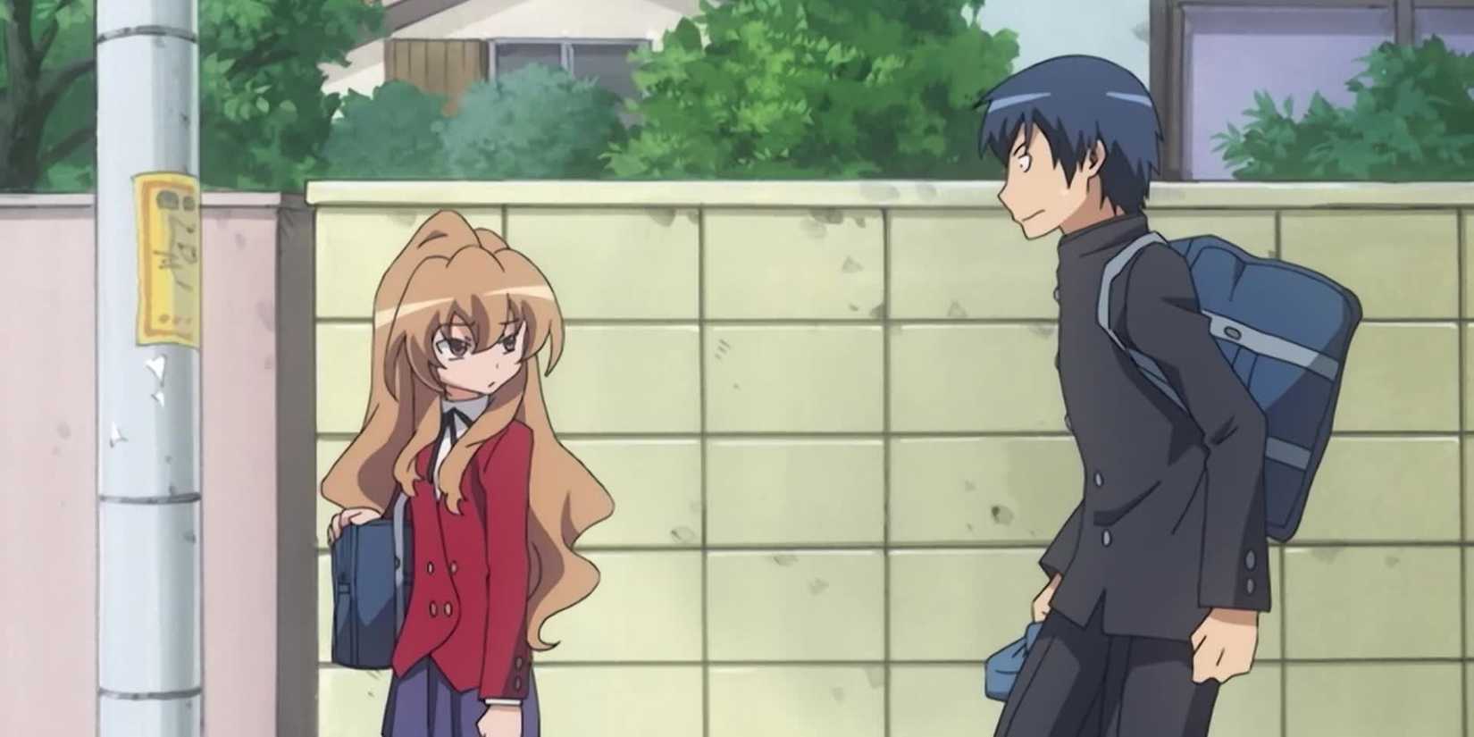 A schoolgirl looks back at a boy following her in Toradora