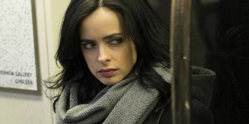 Jessica Jones sitting down on a subway car in Jessica Jones