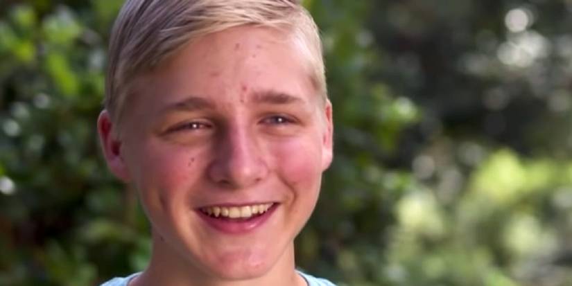 Welcome To Plathville star Isaac Plath smiling outside