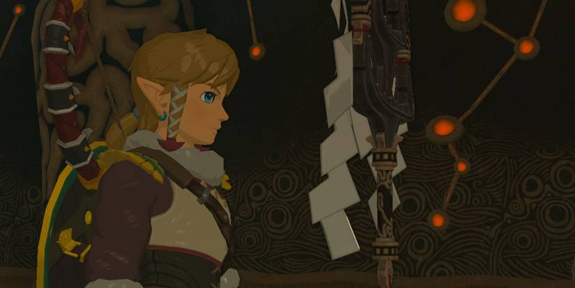 Link looking at the One Hit Obliterator in BOTW